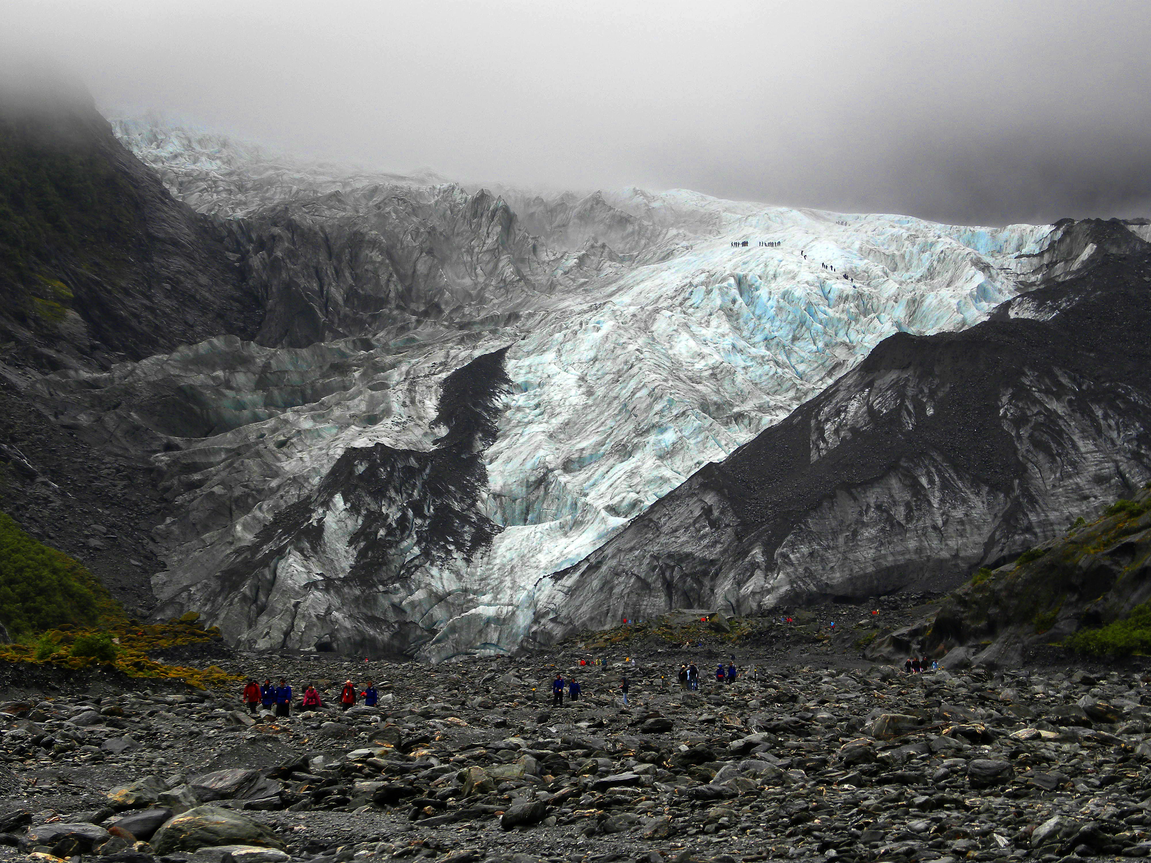 people walking near mountain